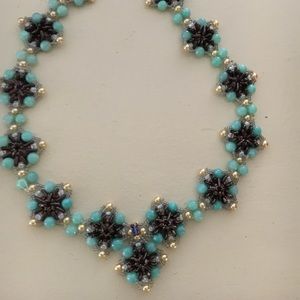 Handmade necklace featuring Czech glass pearls.